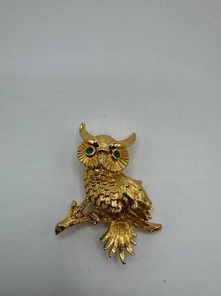 Vintage Monet Gold Tone Owl with rhinestone eyes.