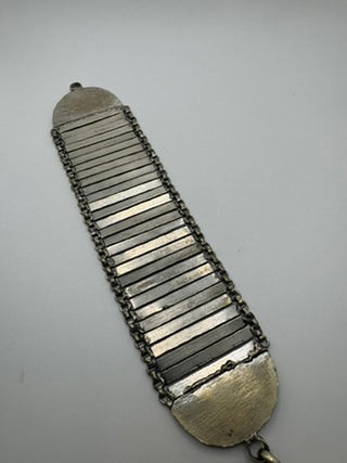 Silver tone articulated bracelet