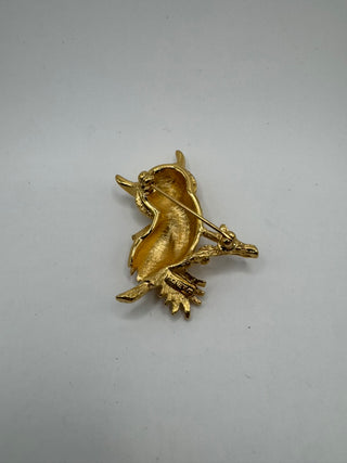 Vintage Monet Gold Tone Owl with rhinestone eyes.