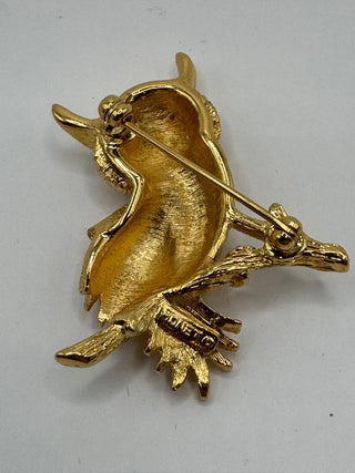 Vintage Monet Gold Tone Owl with rhinestone eyes.