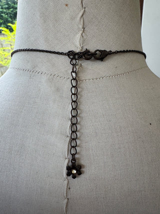 Vintage costume necklace with cross style pendant