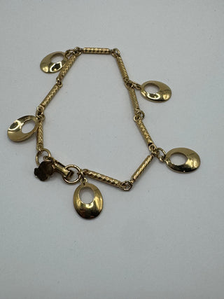 Vintage gold tone with oval disc charms